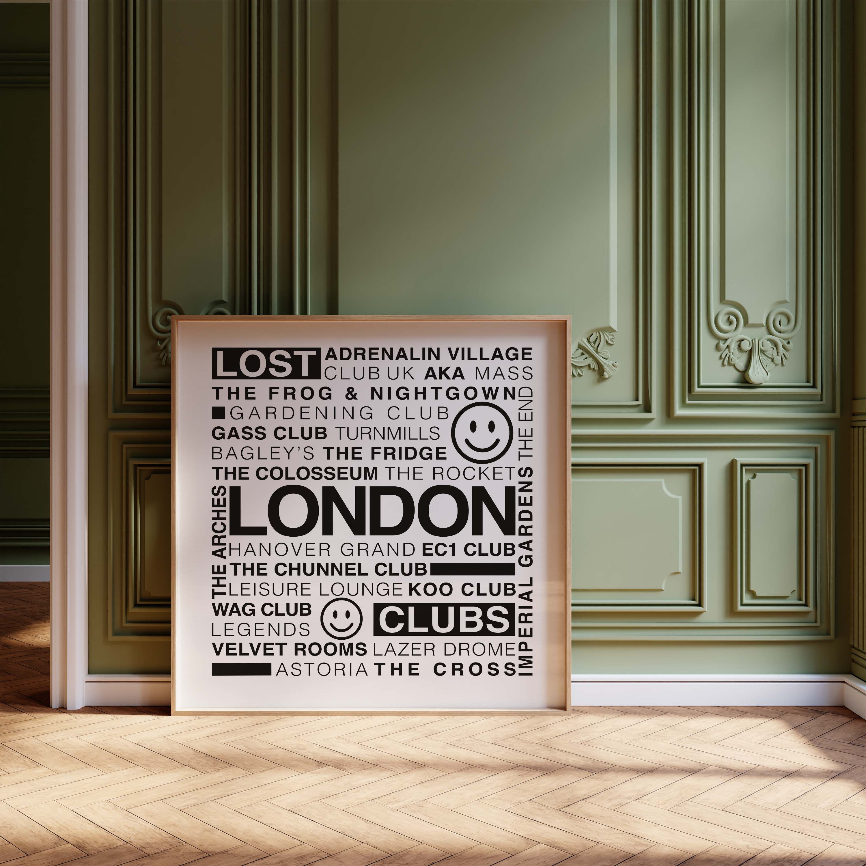 Lost London Clubs square black text print in a wooden frame leaning on a wood floor against an olive ornate wall